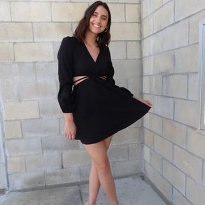 Boutique long sleeve cutout dress.